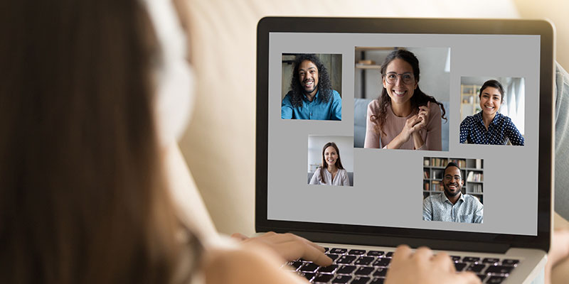 The image of a corporate manager engaged in employee monitoring activity illustrates the mistakes to be avoided with remote employee monitoring.